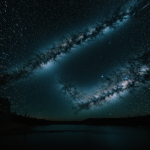 A breathtaking view of a starfield distorted by a gravity lens, showcasing the cosmic phenomenon of gravitational lensing in the universe.