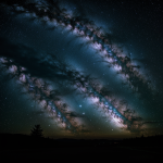 A breathtaking Milky Way galaxy arc wallpaper, capturing the expansive beauty of countless stars and celestial bodies in a mesmerizing night sky panorama.