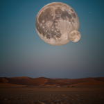A breathtaking view of a full moon rising over a serene desert landscape, casting a mystical glow on the sandy dunes and creating enchanting shadows.