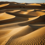 A breathtaking view of golden desert dunes, showcasing their vast expanse and intricate patterns under the warm sunlight, a perfect natural wonder.
