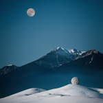 A minimalist depiction of mountains under a moonlit sky, showcasing the elegant simplicity and serene beauty of nature's night-time scenery.