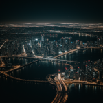 A breathtaking view of city lights seen from orbit, showcasing vibrant urban landscapes illuminated in the vast darkness of space.