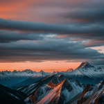 A breathtaking sunrise emerging behind majestic tall mountains, showcasing the serene beauty and tranquility of nature's early morning light.